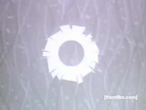 The still features a stylized graphic design typical of UPA animation from the 1950s, showcasing a circular motif with sharp, angular edges that creates a sense of movement or energy. The background appears to have a textured pattern, enhancing the visual interest. This composition likely highlights the features of Caloric gas appliances, embodying the clean and modern aesthetic of mid-century advertisements.