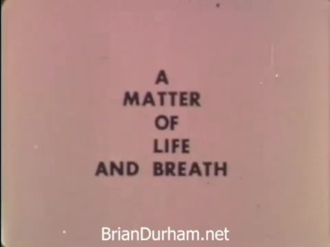 The still features the title 'A Matter of Life and Breath' prominently displayed in a simple, bold font against a muted background. The text emphasizes the seriousness of the topic. This PSA focuses on the experiences of individuals suffering from emphysema, illustrating the challenges of the condition through personal testimonials, as highlighted in the provided context. The overall tone conveys a sense of urgency and the need for awareness about respiratory health issues.