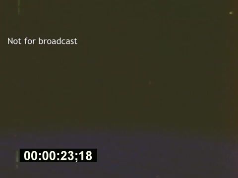 The still from 'Sixty Second Spot' captures a segment of the film that explores the behind-the-scenes process of creating a 7-Up commercial from the mid-1970s. The image prominently features the text 'Not for broadcast,' indicating its use for production reference. Below it, a timecode reads '00:00:23;18,' marking a specific moment in the film. This film provides insights into the preproduction stages, including script development, casting, and filming, culminating in the final commercial presentation.