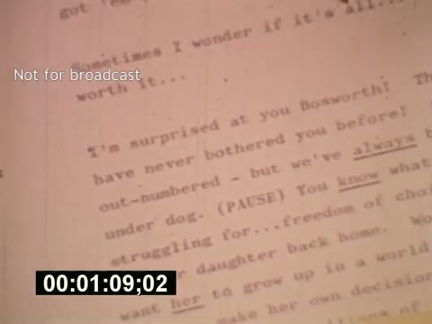 The still from 'Sixty Second Spot' captures a close-up of a script page, featuring dialogue that emphasizes character interaction and emotional depth. It highlights a scene involving a character named Bosworth, reflecting themes of struggle and choices. The timestamp at the bottom indicates this particular moment occurs at 1 minute and 9 seconds into the film. The notation 'Not for broadcast' suggests it's a production-only material, underscoring the film's behind-the-scenes focus on the creation of a 7-Up commercial from the mid-1970s.