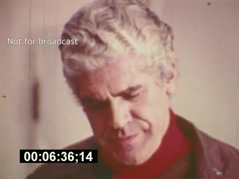 The 16mm still from 'Sixty Second Spot' depicts a thoughtful man, likely involved in the creative process of a 7-Up commercial from the mid-1970s. He appears engaged, suggesting a moment of contemplation or decision-making. The film chronicles the journey from scripting to casting and filming the commercial, culminating in its final presentation at the end. The still conveys the behind-the-scenes effort and artistry that goes into creating a memorable advertisement.