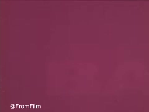 This still from the 1970s Baggies Storage Bags showcases a rich, vibrant purple background, typical of the era's aesthetic. The simplicity and bold color reflect the advertising style of the time, emphasizing the practicality and versatility of Baggies. This visual captures the retro charm and consumer appeal of storage solutions from decades past.  for more vintage insights!