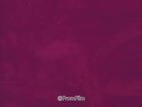 The 16mm still from the 'American Cancer Society animated PSA - 1969' features a vibrant purple background, possibly serving as a backdrop for animated elements. The message emphasizes the importance of health checkups and charitable contributions, underlined by a voice-over from Gene Wilder, which adds a personable touch to the PSA's campaign. This public service announcement likely aims to raise awareness about cancer prevention and support for others in need.