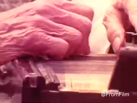 The still from the 1970s American Health Care Association commercial captures a close-up of elderly hands engaged in a task, emphasizing themes of care and attention. The warm color tones and focus on the hands suggest a connection to personal stories and the importance of health and well-being in the older population. This visual stance aligns with the era's emphasis on human experiences within healthcare.   .