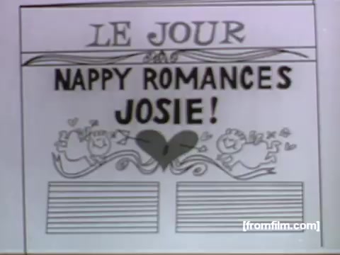 The still features a playful, animated newspaper headline that reads 'LE JOUR NAPPY ROMANCES JOSIE!' with illustrated characters and decorative elements like hearts. This captures the whimsical and lighthearted style typical of UPA animations from the 1950s, aligning with the Aqua Velva Ice Blue aftershave's marketing approach that blends humor and charm.