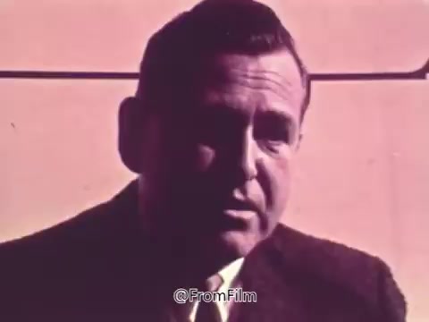 The still from the 'Prevent Blindness PSA' features a man speaking intently about his experience with glaucoma after undergoing an eye exam following a routine physical. He expresses initial indifference about his diagnosis until he learns more about it from a medical book, highlighting the importance of eye health awareness. The overall tone emphasizes the significance of regular eye examinations and understanding eye health issues.