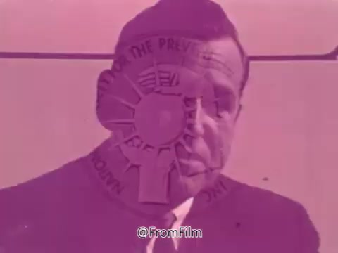 The still from the PSA features a man speaking with a concerned expression, discussing his experience with glaucoma discovered during an eye exam. A woman shares her struggles with changing her glasses frequently due to failing eyesight. The image has a pink tint, with a logo reading 'NATIONAL SOCIETY FOR THE PREVENTION OF BLINDNESS' partially overlayed, emphasizing the video's focus on eye health awareness in the 1960s.