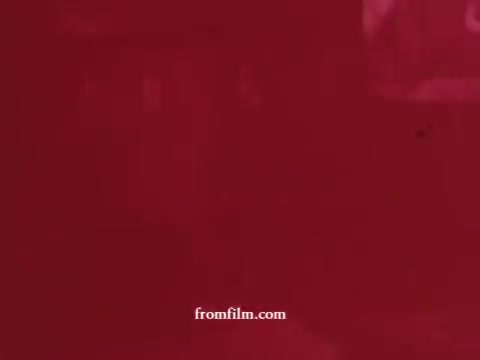 The 16mm still from the 'Airwick Bathroom tablet commercials (1970s)' features a vivid red background, likely a stylized representation reminiscent of advertisements from that era. The absence of clear imagery emphasizes a focus on color and mood typical of vintage advertising, possibly conveying freshness or cleanliness associated with air fresheners. If a mixed still with Sani-flush exists, it may further highlight the bathroom cleaning theme of these products.