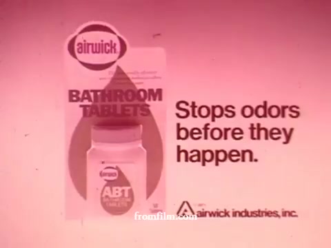 The still shows an advertisement for Airwick Bathroom Tablets, featuring a prominently displayed container of the product and text stating, 'Stops odors before they happen.' The overall design is simplistic, with a color palette that suggests a clean and fresh ambiance, typical of 1970s marketing aesthetics. The branding emphasizes odor prevention, targeting bathroom freshness.