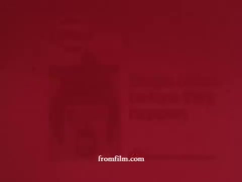 The still features a red background highlighting an Airwick bathroom tablet commercial from the 1970s. The design is simple, with minimal graphics which likely emphasize the product's benefits. A Sani-flush logo appears, indicating a focus on bathroom cleanliness. Overall, it reflects the advertising style of the era, aimed at promoting household hygiene products.