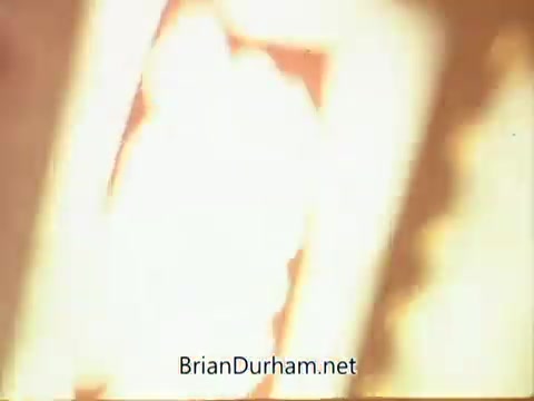 The still from the 1967 PSA by the National Council on Alcoholism features a blurred, fiery background, suggesting themes of intensity or impact. The imagery likely aims to convey the serious consequences of alcoholism. The text at the bottom indicates the source, 'BrianDurham.net,' but further details about the visuals or specific content can't be discerned from the image alone.