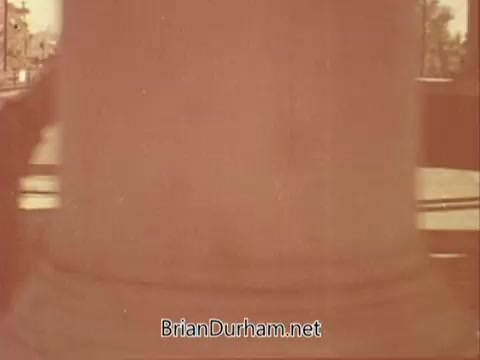 The still from the 1967 PSA by the National Council on Alcoholism shows a close-up of a prominent object or scene, perhaps depicting a somber or reflective tone. The image appears aged, consistent with 16mm film, and may evoke themes related to the impact of alcoholism. The overall composition suggests a focus on awareness and prevention efforts from that era.