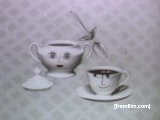 The still features charming, anthropomorphized characters: a teapot with a smiling face and a coffee cup that has a playful expression. The teapot has a lid, and there's a spoon positioned near the coffee cup. The background is patterned, creating a whimsical and lighthearted atmosphere typical of 1950s animated commercials. The design reflects the unique art style of UPA, emphasizing simplistic forms and character expressions.