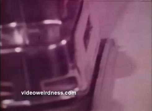 The still from the 'Black and Decker 1972 promo' features a close-up view of a power tool, showcasing its metallic surface and branding. The image has a vintage aesthetic, likely reflecting the design style of that era. Overall, it highlights the emphasis on durability and functionality in Black and Decker's product lineup.