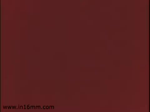 The still from the commercial 'Gas Living Makes Sense' by Lone Star Gas likely features a simple, bold color background, characteristic of advertising from that era. The context suggests a promotion of natural gas benefits in everyday life, emphasizing convenience and efficiency. The 16mm print quality may reflect the vintage aesthetic typical of mid-20th-century commercials.