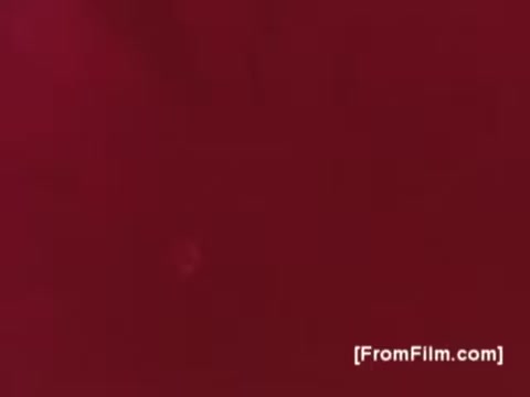 The still from the 16mm print of the Muscular Dystrophy PSA featuring a voice-over by Joan Crawford likely contains a deep red background. This visual choice may evoke strong emotions, aligning with the serious subject of the PSA, which aims to raise awareness about muscular dystrophy and its impacts. The image suggests a somber tone, reflecting the gravity of the disease while emphasizing the need for support and research.