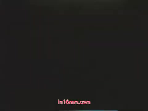 In this 16mm still from the 1960s, featuring the puppets Kukla and Ollie, Ollie expresses concern about his dying plant, which he accidentally harmed while using a pesticide he refers to as a 'bug bomb.' Kukla inquires about what Ollie did to the plant, setting up a humorous yet cautionary tale about the dangers of using pesticides improperly. The scene highlights the unintended consequences of pest control methods in a lighthearted manner typical of children's educational programming from that era.