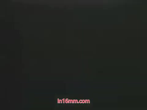 In this still from the 1960s pesticide PSA featuring puppets Kukla and Ollie, the scene illustrates a dialogue between the characters. Ollie expresses distress over his dead plant, attributing its demise to the use of a 'bug bomb' he sprayed. Kukla's concerned response highlights the consequences of poor pesticide use. The setting emphasizes a lighthearted yet cautionary approach to educating viewers about the impact of pesticides on both plants and the environment.