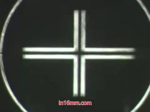 This still from the 1960s PSA featuring Kukla and Ollie showcases a vintage 16mm film format. The context centers on Ollie's dramatic reaction after using a 'bug bomb' on his plant, which has unfortunately died. This highlights the potential dangers of using pesticides improperly, with Kukla questioning Ollie about his actions. The scene conveys a humorous yet cautionary message about plant care and pesticide use. The visual likely features the classic puppetry style characteristic of that era, emphasizing the playful yet educational tone of the PSA.