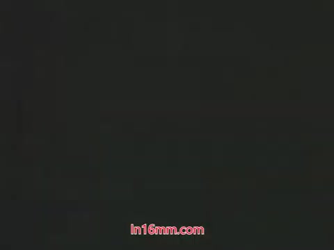 The still features the characters Ollie and Kukla, puppets from the 1960s, in a scene discussing the adverse effects of a pesticide. Ollie is distressed over his plant's demise after using a 'bug bomb,' prompting Kukla to inquire about his actions. This scene serves as a public service announcement for the USDA, highlighting the dangers of improper pesticide use. The overall tone is playful yet instructive, typical of children's programming from that era.