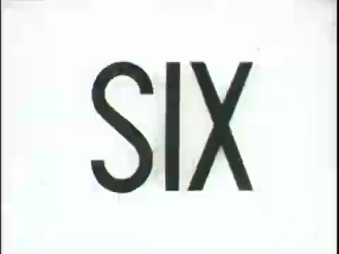 The still features the word 'SIX' prominently displayed in bold, black typography against a plain white background. This visual element suggests a countdown or a numerical emphasis within the context of the PSA for Religious Overseas Aid, likely highlighting a significant message or statistic related to the campaign. The simplicity of the design focuses the viewer's attention on the text.