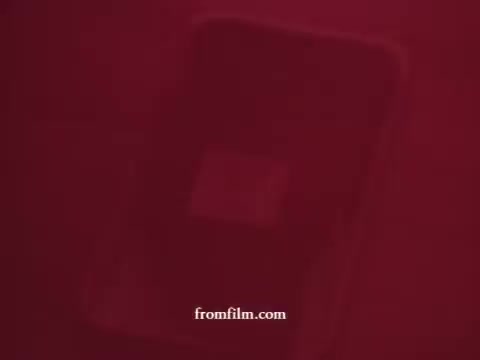 The still from 'Chatham Supermarket Commercials' features various elements commonly associated with grocery shopping. It includes images or references to items like apples and bananas, shopping carts, and promotions such as coupons. Additionally, it highlights products like fresh-cut meats and potatoes, culminating in a focus on steak. The aesthetic is reflective of vintage 16mm film quality, capturing a nostalgic portrayal of supermarket offerings.