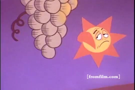 The still from the 1970s Kellogg's Raisin Bran commercial features a cartoonish sun with a sad expression next to a cluster of grapes. The vibrant colors and playful design reflect the cheerful yet slightly whimsical tone typical of cereal advertisements from that era. The purple background adds to the nostalgic visual style, emphasizing the animated elements.