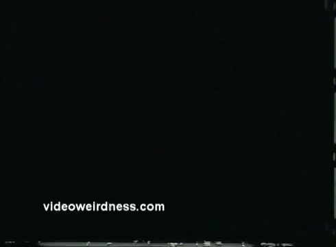 The still from 'Come Back, Charleston Blue' features a 16mm film aesthetic, indicative of the era's blaxploitation genre. The film, which stars Godfrey Cambridge and Raymond St. Jacques, centers on the characters Coffin Ed Johnson and Gravedigger Jones as they navigate crime and corruption in Harlem. The context suggests a gritty narrative style, reflecting both the societal issues of the time and the dynamic portrayal of Black culture. The film is known for its exploration of racial themes and urban life, drawing inspiration from Chester Himes' works.