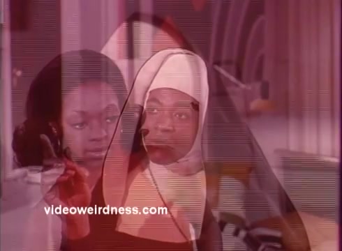 The still from 'Come Back, Charleston Blue' features a layered visual effect, highlighting two women: one in a habit (suggestive of a nun) and another appearing to engage with her, possibly on the phone. The image carries a vintage aesthetic characteristic of the 1970s blaxploitation genre. This particular film, a sequel to 'Cotton Comes to Harlem,' is known for its social commentary and unique characters like Coffin Ed Johnson. The color palette and visual distortion suggest a stylized approach common in promotional materials of the era, reflecting the film's cultural significance and artistic style.