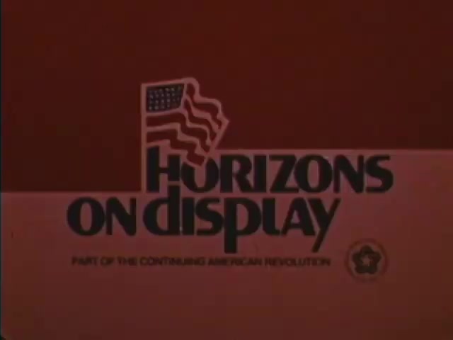 The still features the title 'HORIZONS ON DISPLAY' prominently displayed in bold lettering. Above the text is a graphic of the American flag waving, positioned over a stylized state outline. The background is a solid red hue. Beneath the main title, there’s a slogan stating 'PART OF THE CONTINUING AMERICAN REVOLUTION,' along with a circular emblem, likely representing a governmental or organizational affiliation. This visual emphasizes themes of patriotism and historical reflection related to the 1976 Bicentennial celebrations.