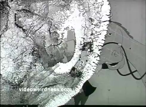 The still from the 1950s animated commercial 'It's Quilted' for Kaiser Aluminum Foil features a stylized, abstract backdrop with textures and patterns reminiscent of old film degradation. There are elements of animation, suggesting characters or objects, but the details are obscured by the overlay of grain and visual artifacts typical of 16mm prints. The overall aesthetic reflects the whimsical and colorful animation style of mid-20th century advertisements.