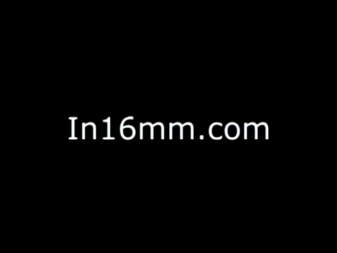 The still features a plain black background with the text 'In16mm.com' displayed prominently in white. It suggests a connection to vintage film, likely pertaining to the 1970s Job Corps public service announcement, but does not illustrate any specific content from the PSA itself. The minimalist design emphasizes the website name without any additional imagery or context.