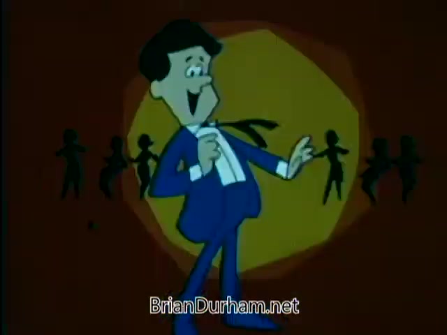 The still from the 1967 American Chiropractic Association PSA features a cartoon character in a blue suit, singing or performing with enthusiasm. He has a cheerful expression and is gesturing with one hand, suggesting engagement with the audience. The background shows shadowy figures that appear to be dancing, creating a lively atmosphere. The overall tone is upbeat and promotional, highlighting chiropractic care.