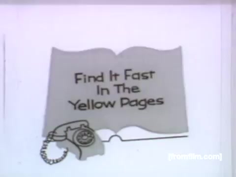 The still features a stylized, animated graphic that highlights a phone and a partially open book labeled 'Find It Fast In The Yellow Pages.' The minimalist design emphasizes the message of quickly accessing information through the Yellow Pages, characteristic of 1950s advertising. The overall aesthetic reflects the era's animated commercials, promoting the efficiency of the directory service.
