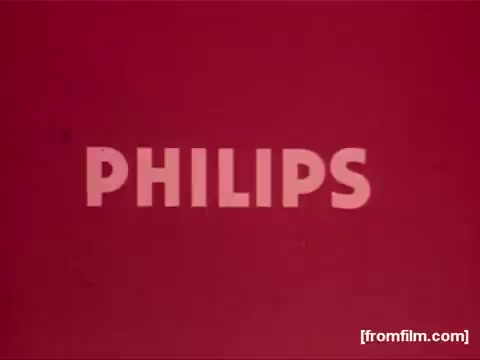 The still from the 'Philips Ladyshave Commercial - Brazil (1970's)' features the word 'PHILIPS' prominently displayed against a solid red background. The font is bold and modern, typical of the advertising style of the 1970s. The vibrant color scheme and simple design reflect the promotional aesthetic of that era. The overall composition emphasizes brand recognition and appeal.