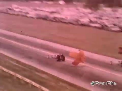 The still from 'Dragsters and Cars' featuring Don Garlits shows a drag racing scene, likely from the 1960s. Garlits emphasizes the importance of a well-maintained car for winning drag races. The Dodge in the image appears to be a classic model typical of that era, possibly from the late 1960s. If you need a specific year, additional details about the car's features would be necessary for a more precise identification.