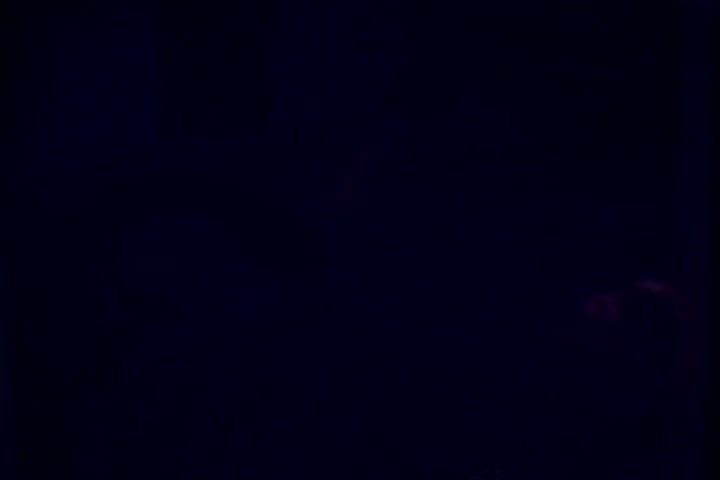 The still from 'Drug Abuse: Some Comments from the Morgue' captures a dimly lit, serious scene, likely emphasizing the grim realities of drug abuse. It features a depiction of an environment associated with death, potentially suggesting the consequences of substance misuse. The focus appears to be on the stark and unsettling nature of the subject matter, reflecting the film's intended anti-drug message from the 1970s. The overall mood is somber and impactful, aligning with the tragic themes addressed in the documentary.