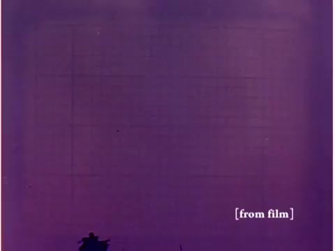 The still from the Bell System film depicts a section of an oscilloscope's grid, casting a purple hue due to film lab defects. The presence of the oscilloscope aligns with the film's focus on preventing data transmission errors, showcasing technology relevant to the era of 1967. The image lacks clarity due to the default, reflecting the characteristics of a damaged or improperly processed film negative.