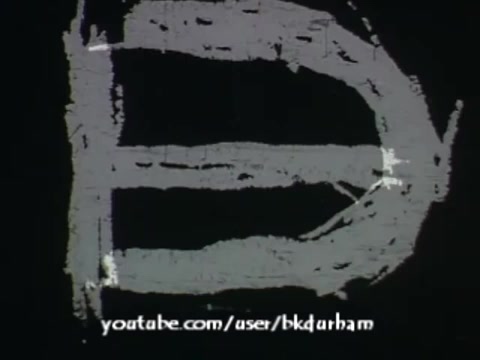 The still features a bold, hand-drawn letter 'D' against a black background, likely emphasizing a concept related to linguistics. The texture and appearance suggest a vintage aesthetic, reminiscent of kinescopes from the era. The image combines educational elements with a distinct visual style characteristic of mid-20th century film. The URL at the bottom hints at an online resource for further exploration.