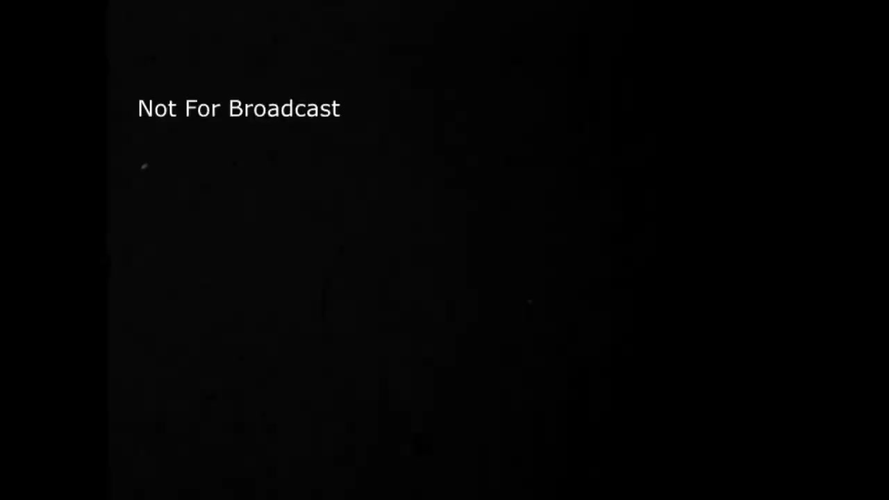 The still from the 1969 Esso Extra gasoline commercial features a black background with the text 'Not For Broadcast' prominently displayed. This indicates the material is likely a preliminary or internal version not meant for public airing. The simplicity of the black and white design reflects the aesthetic style of the era. The commercial likely aimed to promote Esso Extra as a quality fuel choice before the brand transitioned to Exxon in the early 1970s.