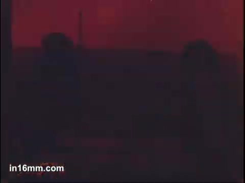 The still from the Birdseye Frozen Parisian Vegetables commercial features a dimly lit scene with a predominantly red hue. The low visibility might suggest a focus on atmosphere rather than specifics, likely highlighting the vegetables in a creative or stylized way. The setting may imply a kitchen or dining environment, aimed at evoking warmth or a sense of home cooking.