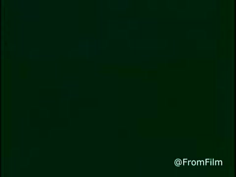 The still from the 1970s Kellogg's Shredded Wheat commercial features a simple, solid green background. It reflects the vintage aesthetic typical of advertisements from that era, focusing on clarity and direct messaging associated with breakfast foods. The absence of detailed visuals emphasizes the brand's commitment to wholesome ingredients, aligning with the marketing strategies of the time.   For more vintage film insights, follow us on Twitter @FromFilm.