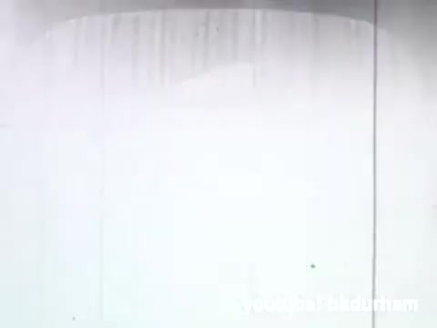 The still from the 1950s kinescope of a San Diego-based religious TV show likely features a simple and evocative scene typical of that era's programming. The picture may exhibit characteristic film grain and potentially faded colors, emphasizing a nostalgic feel. It represents a time when television was transitioning into a significant medium for religious outreach, showcasing the cultural and community aspects of faith during the 1950s. The format and visual style would reflect the technology of kinescope recordings, used to capture live broadcasts for later viewing.