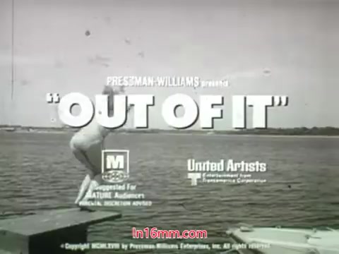 The still features a black-and-white image from the 1968 trailer of 'Out of It,' showcasing the film's title prominently. A person is depicted mid-action, apparently about to jump into a body of water, creating a sense of excitement or spontaneity. The credits mention 'Pressman-Williams' and 'United Artists,' indicating the film's production background. The overall aesthetic captures the era's vibe, aligning with the characteristics typical of trailers from that time.