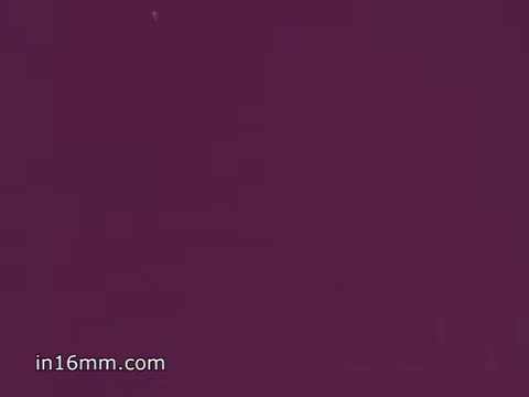 The still from the 1968 PSA featuring Anita Bryant shows her addressing viewers against a backdrop related to American history, specifically referencing Valley Forge. The segment juxtaposes a patriotic song with her voiceover, emphasizing themes of American perseverance and freedom. The visual likely reflects a blend of historical and contemporary sentiments about American values, reinforcing the idea of unity and brotherhood.