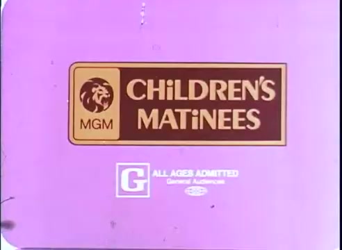 The still features a promotional graphic for 'Children's Matinees,' produced by MGM. The background is a solid pink, with a prominent logo that includes a lion emblem. The text reads 'CHILDREN'S MATINEES' in bold white letters, accompanied by a 'G' rating, indicating it is suitable for all ages. The design is simple and colorful, aimed at engaging a younger audience.