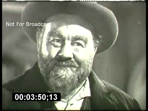 The still features a smiling, bearded man wearing a hat, likely from a black-and-white film shown during the ABC Sunday Night Movie promos of the 1960s. The image has a timestamp in the corner, indicating it’s a still from a recorded film. The context suggests it may be a nostalgic or promotional piece highlighting classic movies aired on Sunday nights.