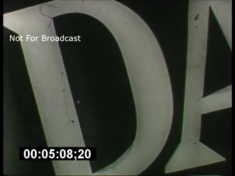 The still features a close-up of large, stylized text, likely part of the promotional graphics for the ABC Sunday Night Movie from the 1960s. The text appears slightly damaged or worn, suggesting it might have been taken from an older film reel. A timecode and a 'Not For Broadcast' label are present, indicating that this is a private or archival material rather than broadcast quality. The overall aesthetic reflects the classic television era of the 1960s.