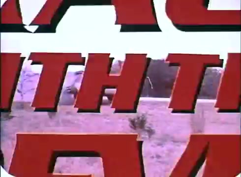 The still from the trailer for 'Race with the Devil' features bold, red lettering prominently displaying the title against a backdrop of a rural landscape. The image captures a sense of urgency and adventure, typical of 1970s thriller films. The colors and graphics evoke a retro aesthetic, reflecting the film's era and genre.