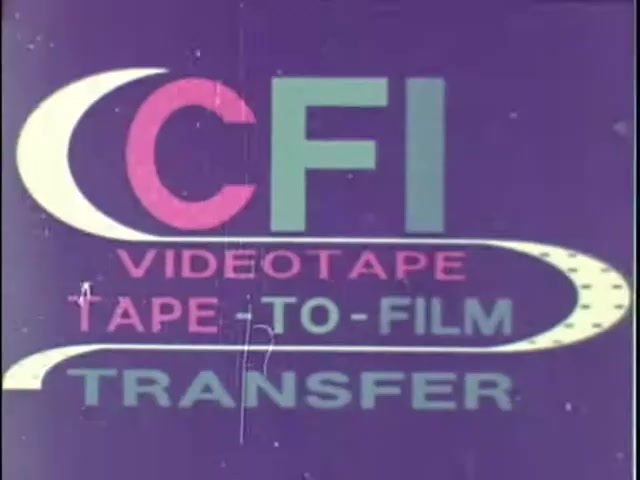 The still features a graphic with the text 'CFI VIDEOTAPE TAPE-TO-FILM TRANSFER.' The design includes a combination of colors, with 'CFI' prominently displayed in green and pink, surrounded by circular and curved shapes. The background is a deep purple, and the overall aesthetic suggests a vintage style, typical of promotional materials from the era of videotape to film transitions.